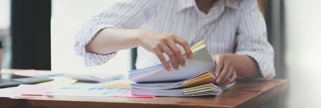 business-documents-concept-employee-woman-hands-working-stacks-paper-files-searching-checking-unfinished-document-achieves-folders-papers-busy-work-desk-office-soft-focus.jpg